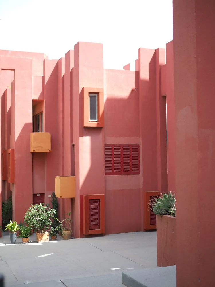 Terracotta architecture photographed by Benjamin Damm, shown through a geometric crop